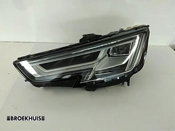 Headlight, left Audi A4