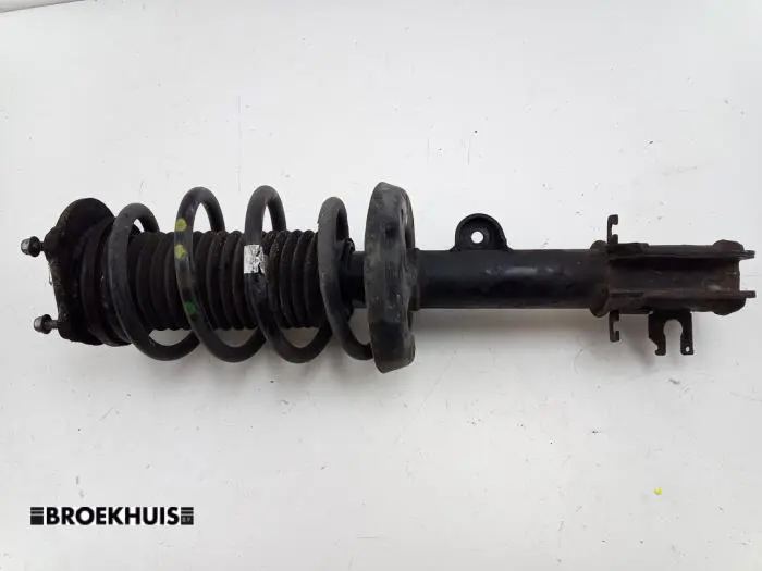 Front shock absorber rod, left Opel Combo