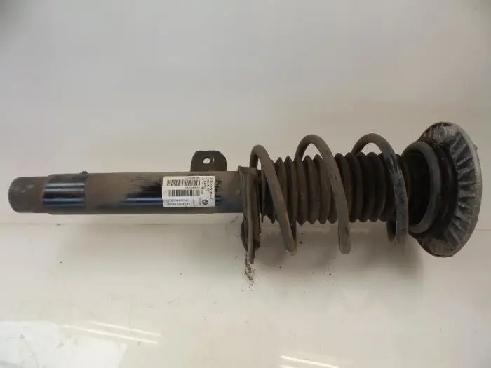 Front shock absorber rod, left BMW 1-Serie