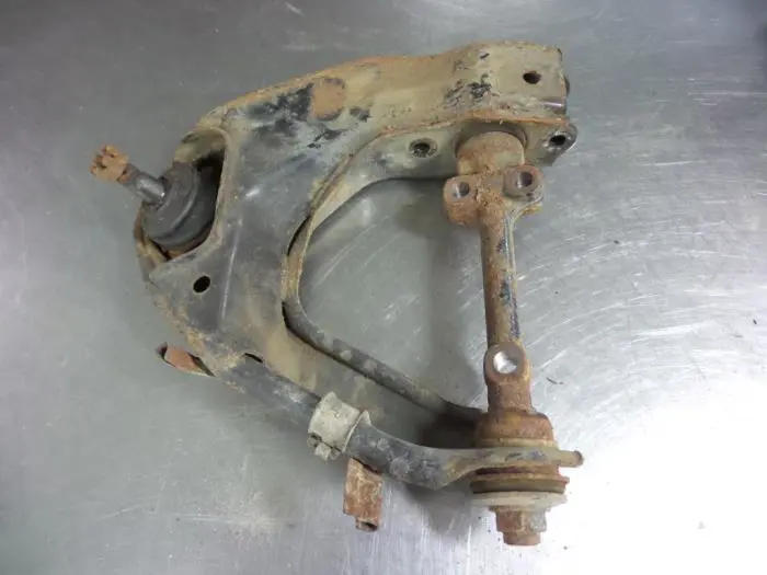 Front upper wishbone, left Toyota Hilux